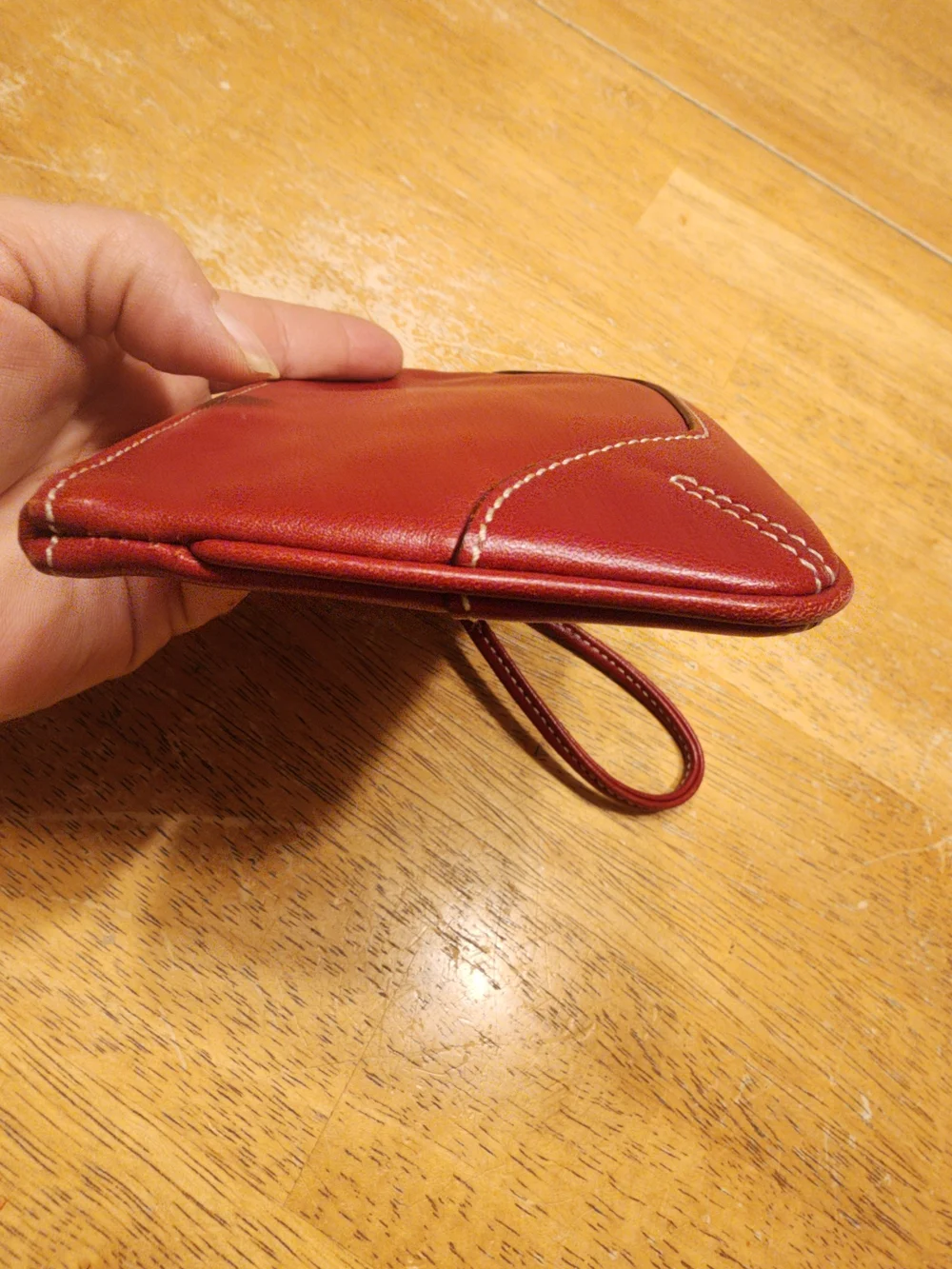 vintage Coach red leather Soho mini wristlet pouch featuring white contrast